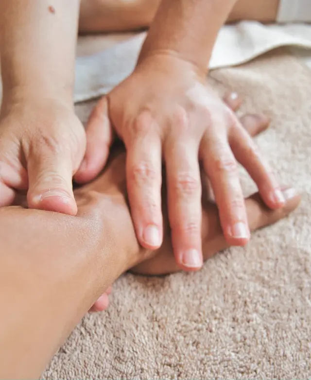 A relaxing foot massage on soft towels
